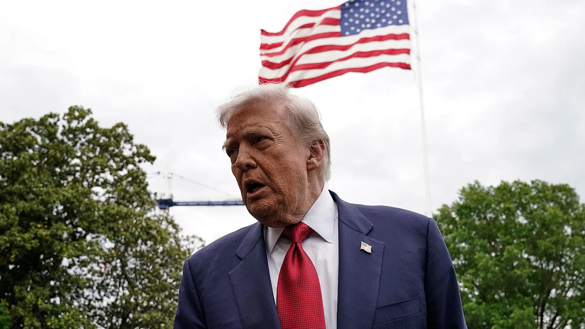 Donald Trump speaks to reporters at White House.
