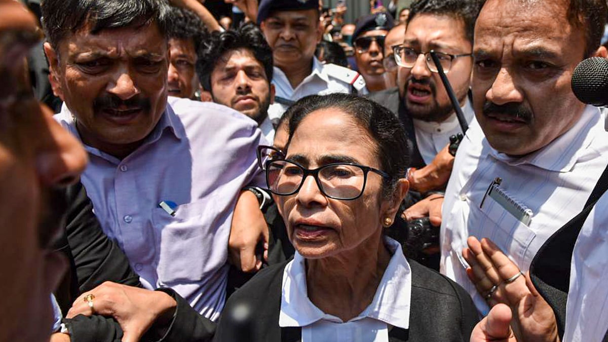 Mamata Banerjee leaves Calcutta High Court after appearing in a post-poll violence case in Kolkata.