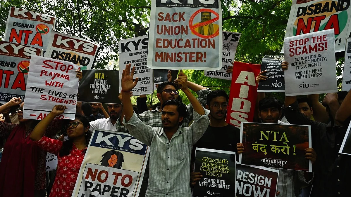 AIDSO members and students protest the NEET 2026 paper leak at New Delhi, 14 May