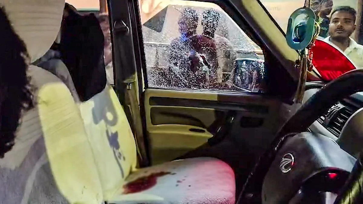 The damaged vehicle after the shooting in Madhyamgram.