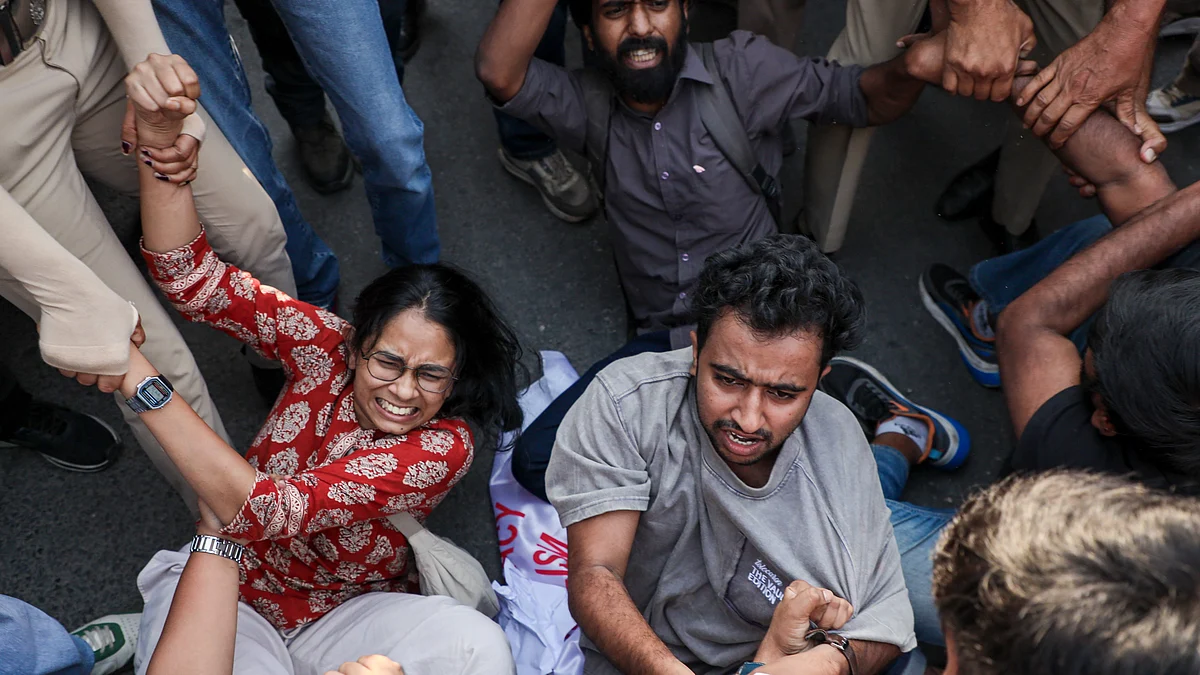 SFI activists being detained during a protest demanding cancellation of NEET-UG 2026 over paper leak.