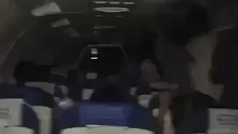 The entire aircraft cabin fell dark following a malfunction in the ground power unit.