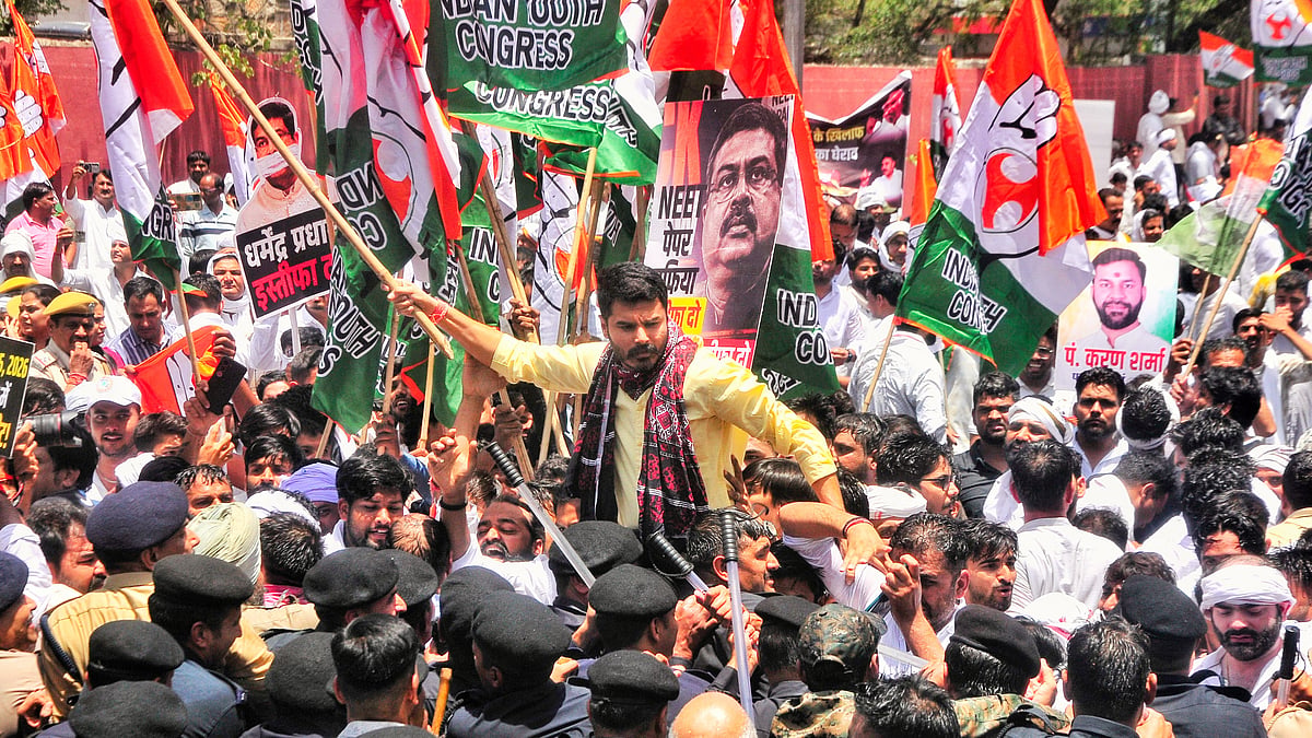 Congress workers on a protest march towards the BJP Rajasthan HQ in Jaipur, 21 May