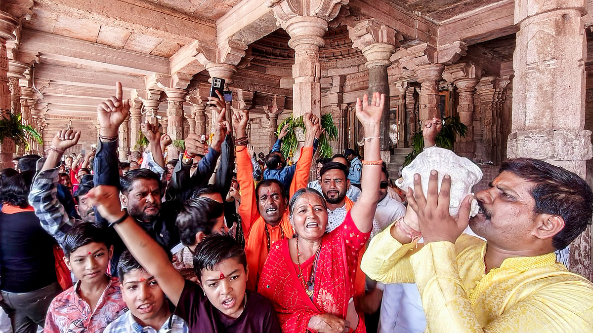 People offer prayers at the Bhojshala complex following the Madhya Pradesh High Court verdict, 22 May
