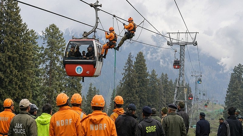 Disaster response forces rescue stranded passengers from Gulmarg cable car project.
