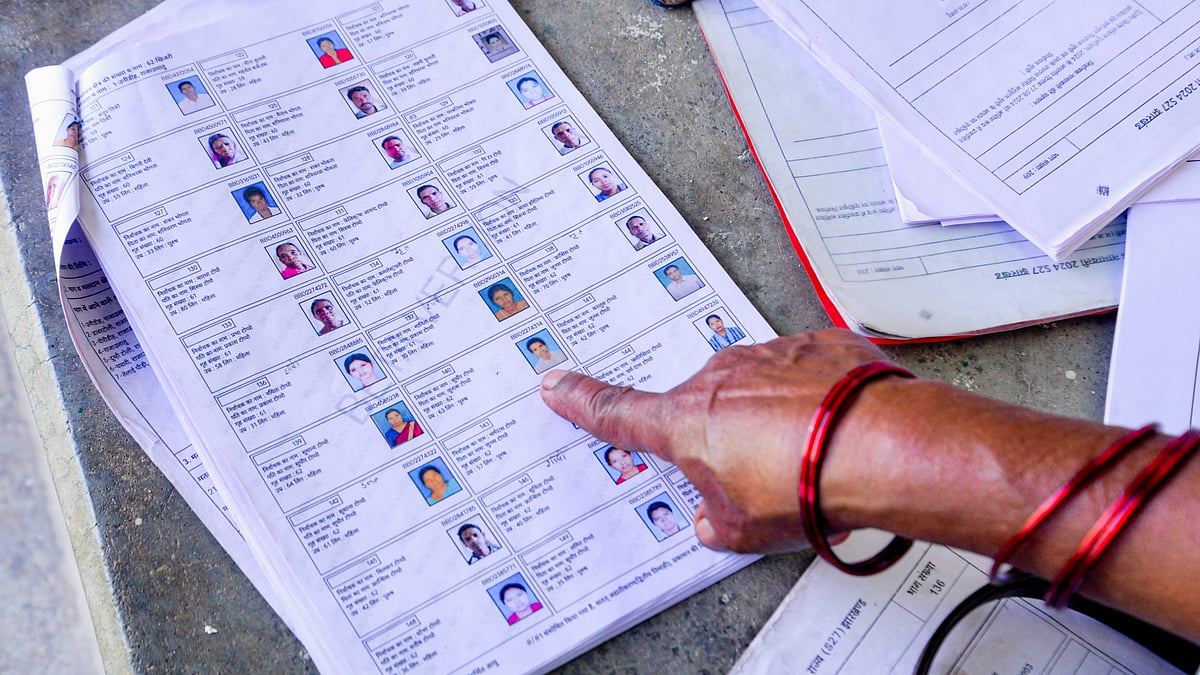 BLOs cross check voter lists ahead of the Special Intensive Revision (SIR), in Ranchi, Jharkhand, 23 May