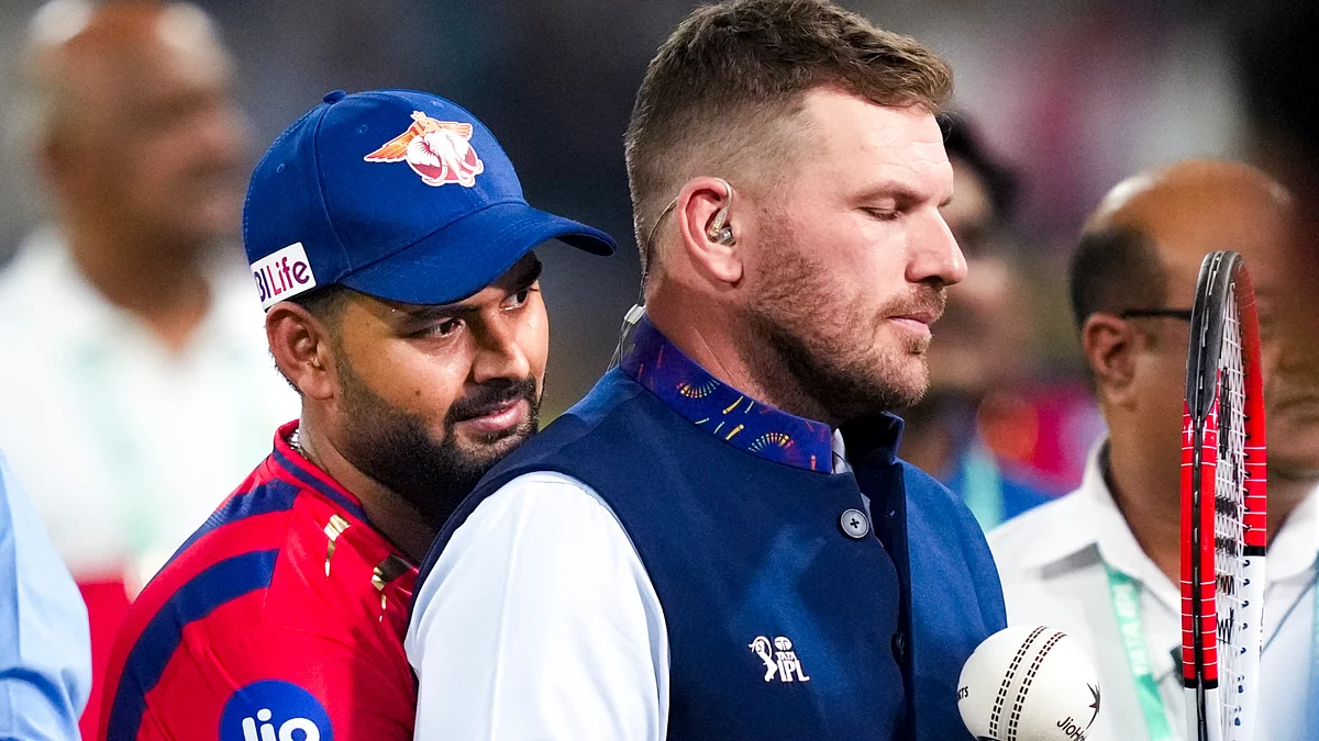 Pant shares a light moment with Aaron Finch after a match between LSG and PK in Lucknow, 23 May