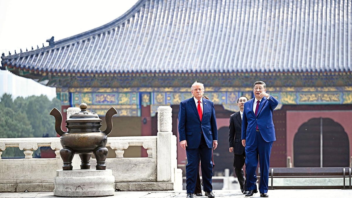 Xi Jinping and Donald Trump during the latter's visit to China earlier this month