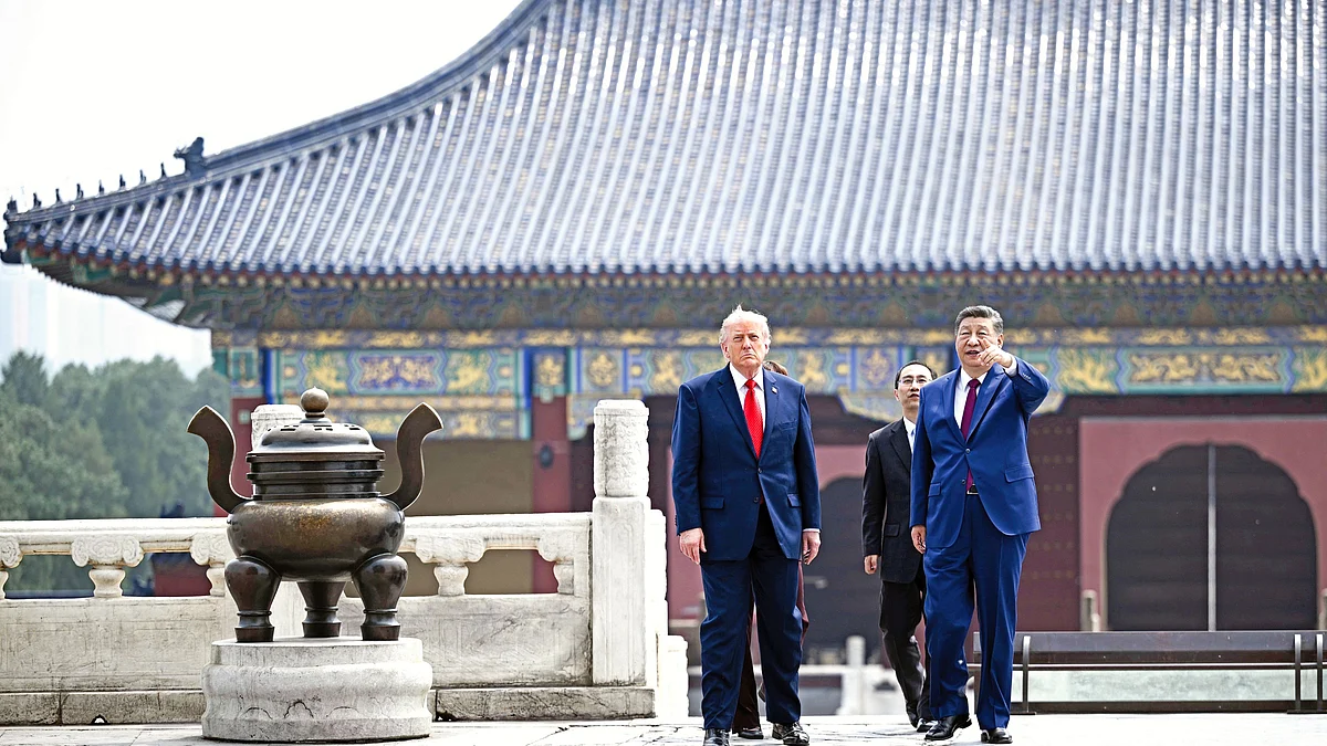Xi Jinping and Donald Trump during the latter's visit to China earlier this month