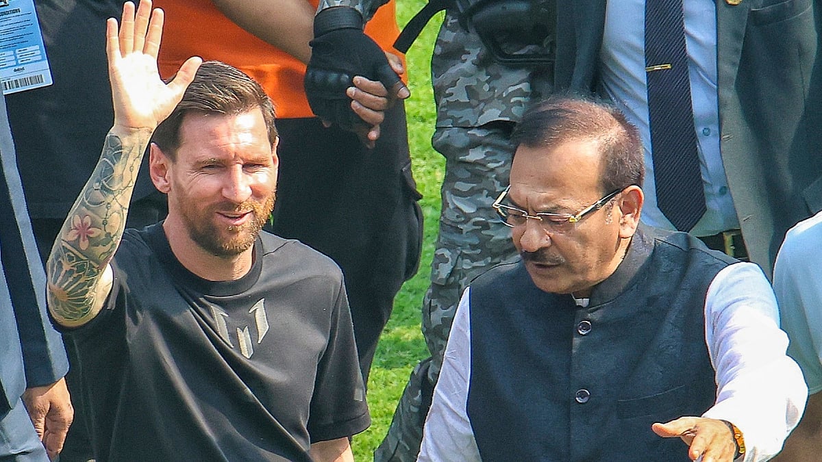 Lionel Messi with Aroop Biswas arrives at Salt Lake Stadium in Kolkata.