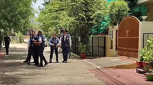 A CBI team at the residence of the accused Giribala Singh in Bhopal