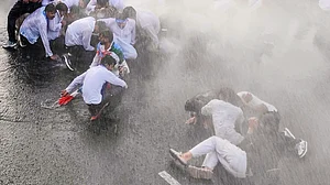 Water cannons being used on NSUI members during a protest over the NEET paper leak in Bhopal, 30 May