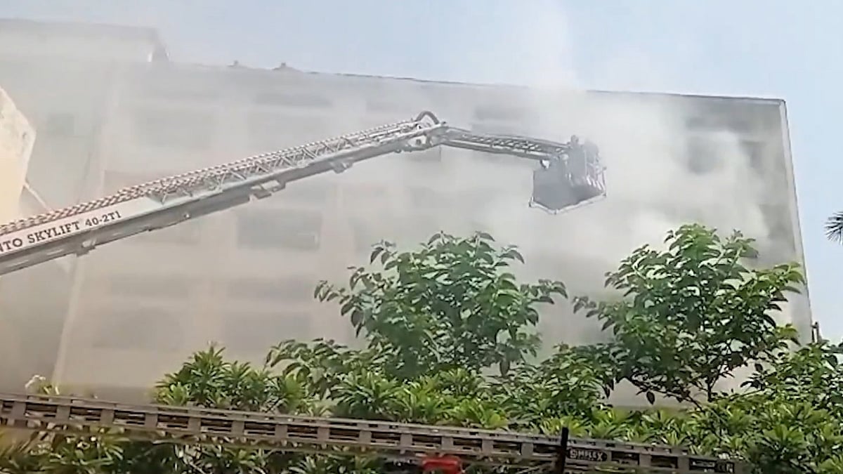 Firefighters battle a blaze at Ministry of Education office in Delhi.