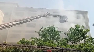 Firefighters battle a blaze at Ministry of Education office in Delhi.