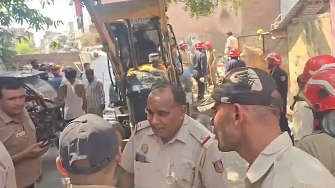 Police investigate the blast site in New Delhi.
