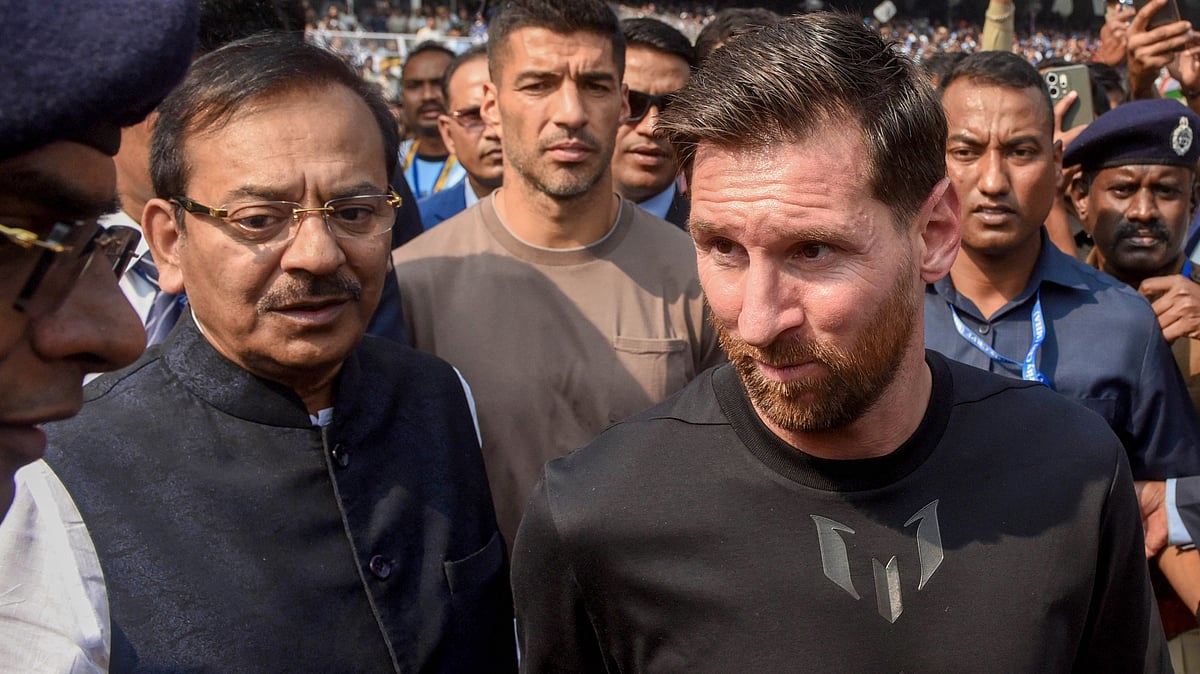 Aroop Biswas with Lionel Messi at Yuva Bharati Krirangan in Kolkata.
