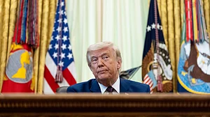 Donald Trump speaks in the Oval Office of the White House.