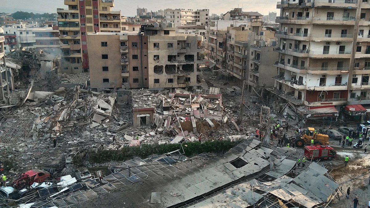Rescuers at the site of an Israeli airstrike that damaged a hospital in Tyre, southern Lebanon.