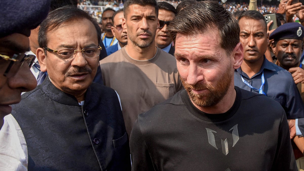 Lionel Messi with Aroop Biswas arrives at Salt Lake Stadium in Kolkata.