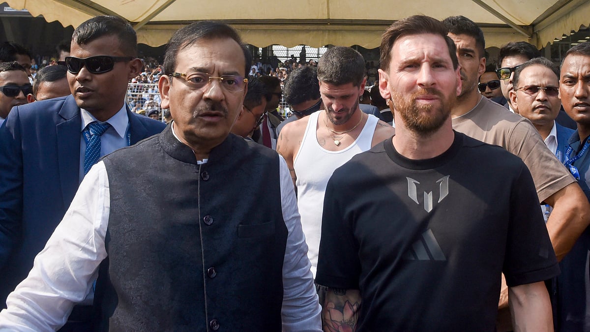 Lionel Messi with Aroop Biswas at Salt Lake Stadium in Kolkata.