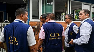 CID officials arrive at the TMC party office next to Mamata Banerjee's residence, 9 June