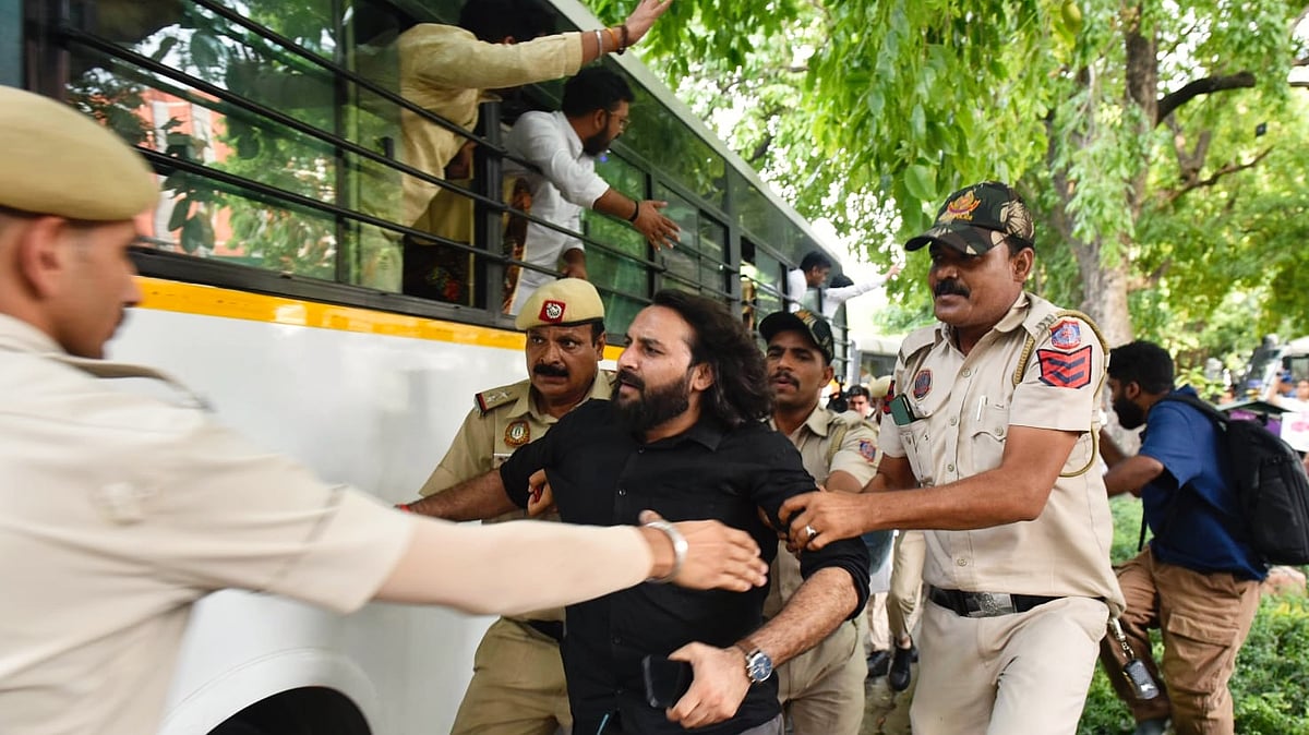 Delhi Police detain Congress workers protesting over Natarajan's disqualification, in New Delhi, 12 June