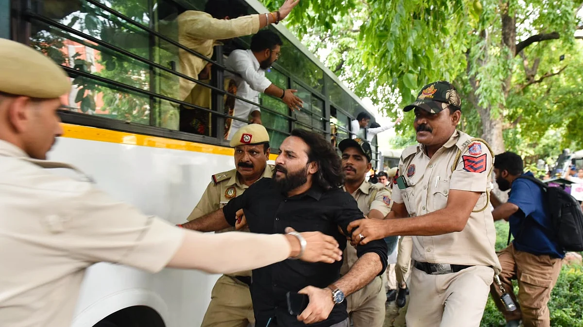 Delhi Police detain Congress workers protesting over Natarajan's disqualification, in New Delhi, 12 June