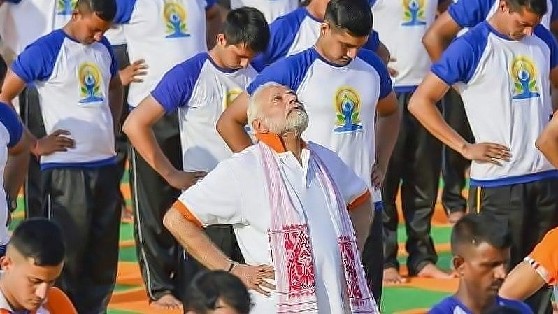 Narendra Modi leads a yoga session.