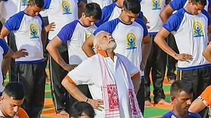 Narendra Modi leads a yoga session.