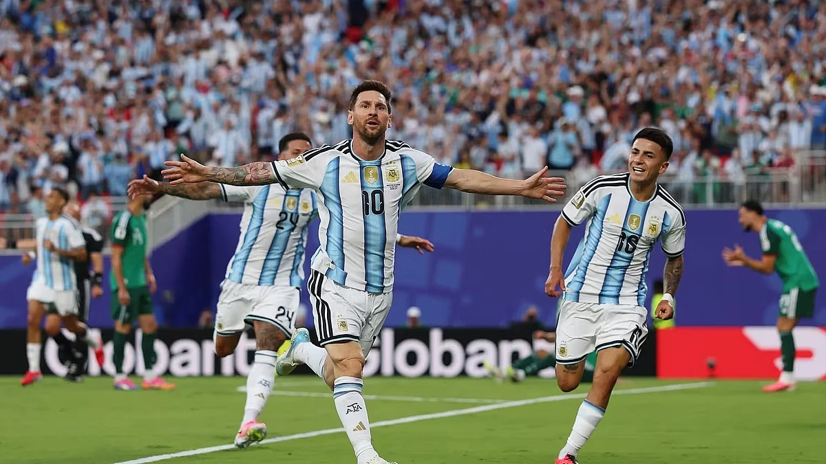 Lionel Messi celebrates after scoring against Algeria.