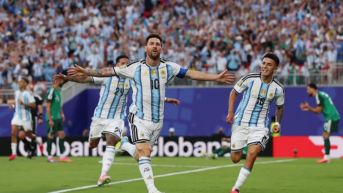 Lionel Messi celebrates after scoring against Algeria.