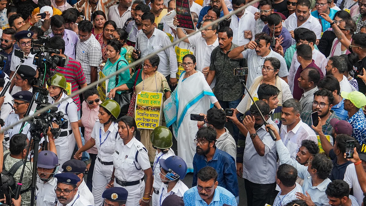 TMC supremo Mamata Banerjee takes part in a protest march in Kolkata.