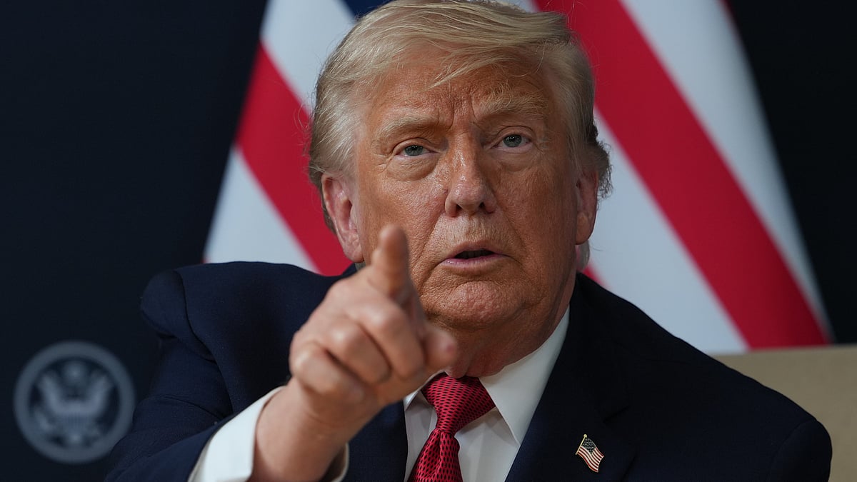 Donald Trump gestures during a meeting in Evian-les-Bains, France.