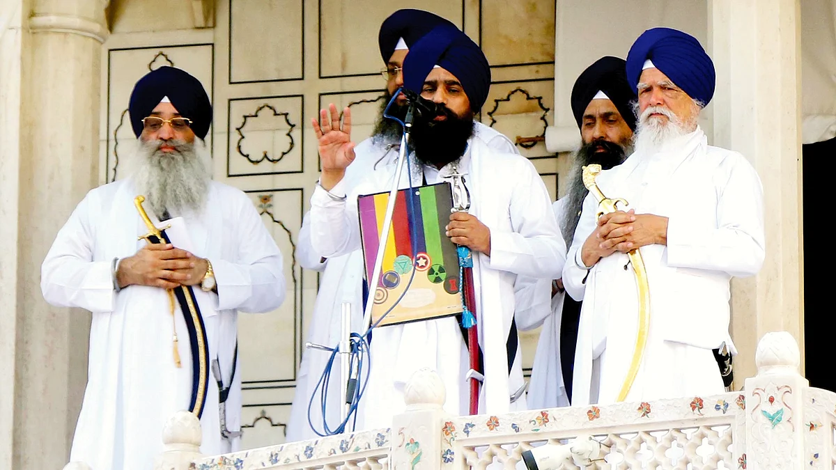 Jathedar Giani Kuldeep Singh Gargajj (C) reads the hukamnama against CM Bhagwant Mann