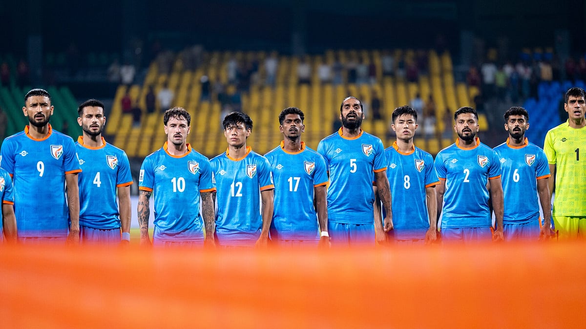 Blue Tigers stand for the national anthem before a recent game