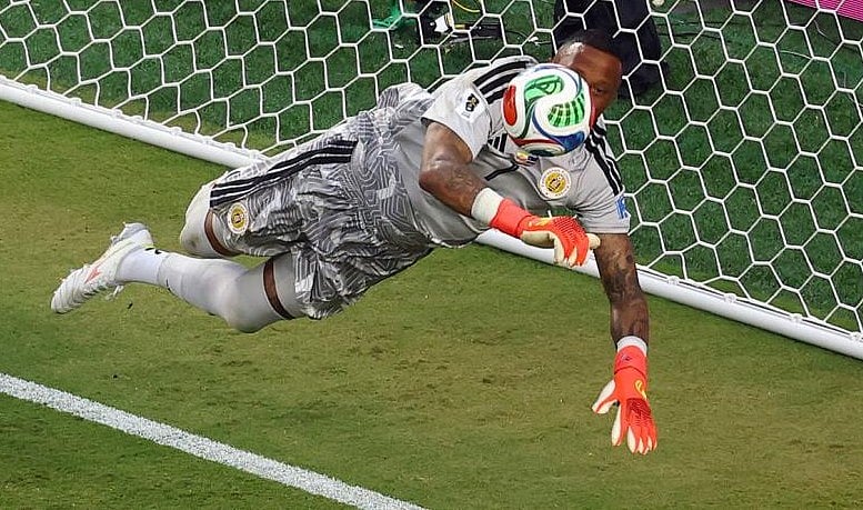 A bird or a plane ? Eloy Room makes one of his 15 saves against Ecuador