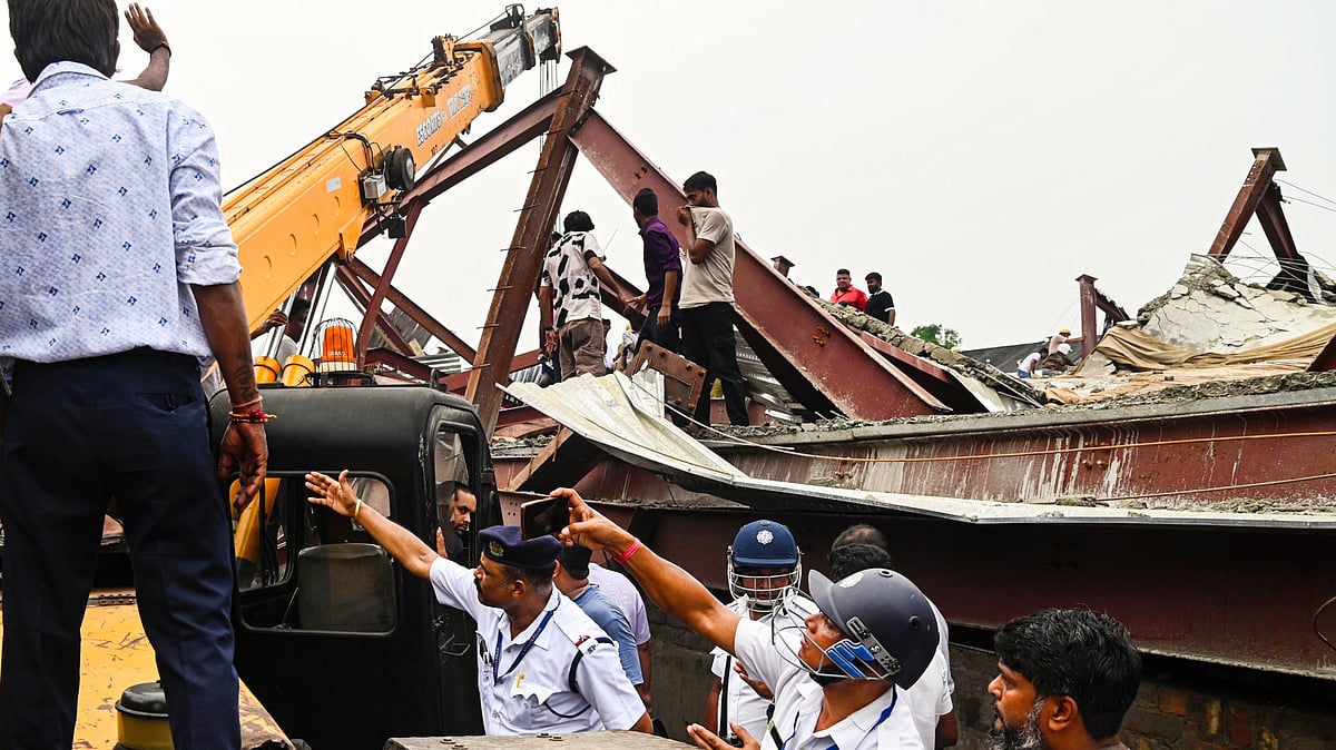Police and rescuers at the collapse site