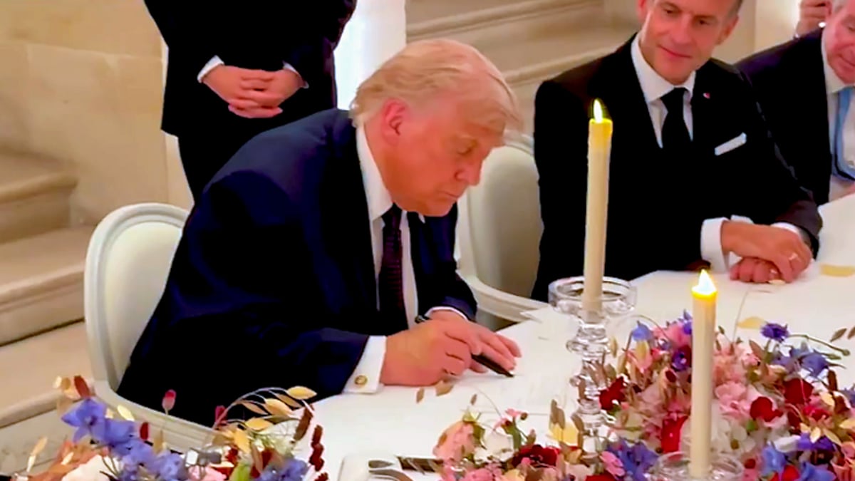 Donald Trump signs Iran MoU at Palace of Versailles in France.