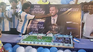 Messi mania: Cake-cutting ceremony in progress in Kolkata
