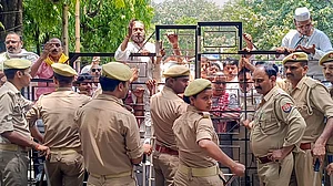 Congress workers protest over alleged Ram Temple donation embezzlement in Ayodhya.
