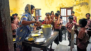 It’s mid-day meal time in a government primary school on the outskirts of Kolkata