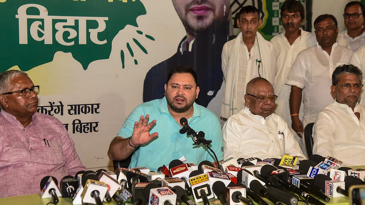 RJD leader Tejashwi Yadav addresses a press conference in Patna, Bihar, Sunday.