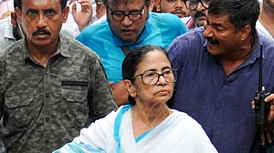Mamata Banerjee joins a protest march by hawkers in Kolkata.