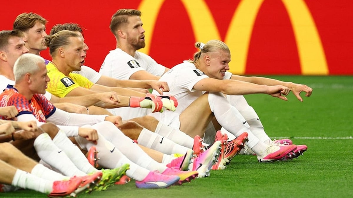 Erling Haaland (in front) leads traditional Norway celebrations after win against Ivory Coast