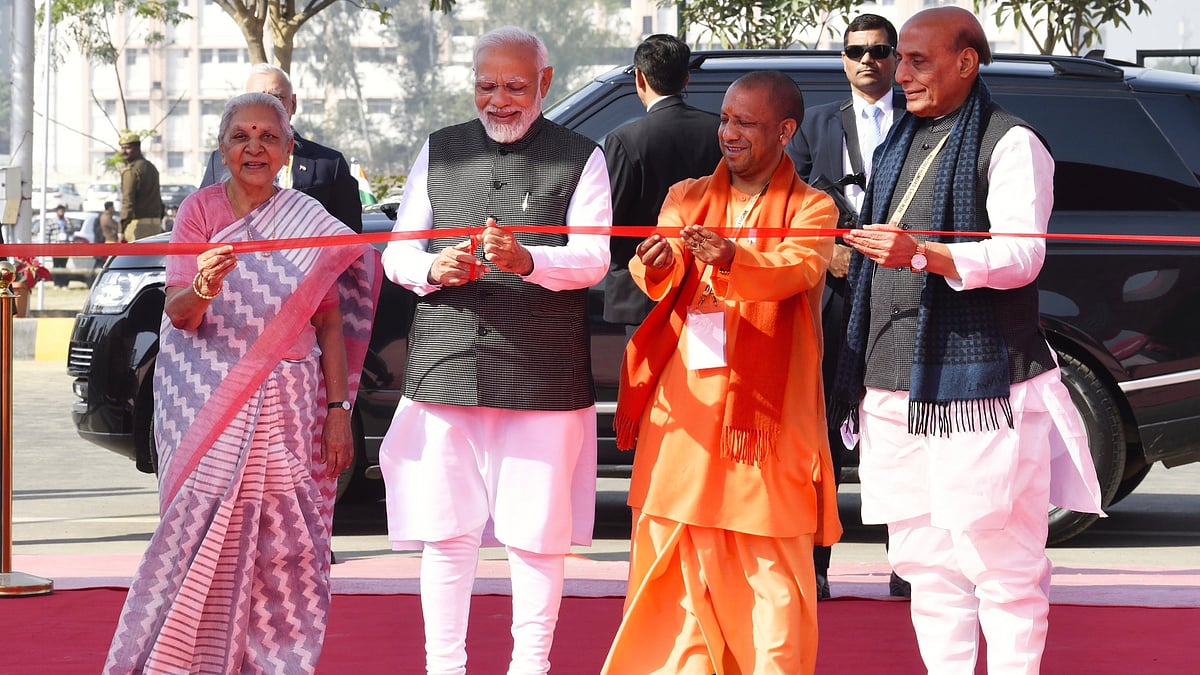 L-R: Gov. Anandiben Patel, PM Modi, CM Adityanath, and defence minister Rajnath Singh at the 2023 summit