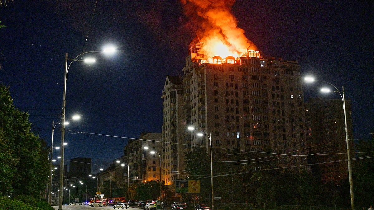 An apartment building burns after a Russian missile attack in Kyiv, 2 July