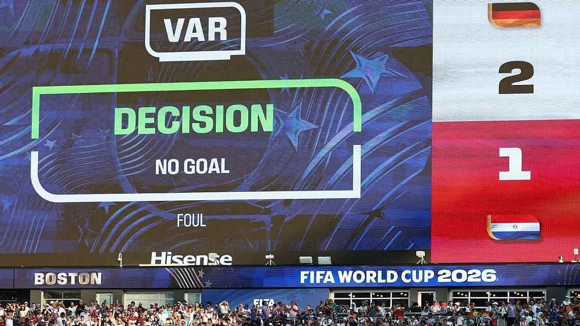 The giant scoreboard shows the disallowed goal for Germany