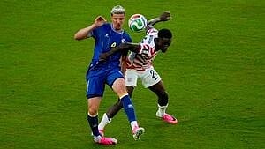Folarin Balogun charges into the Bosnian player which earned him marching orders