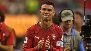 A tearful Ronaldo leaves the ground after Portugal's World Cup exit
