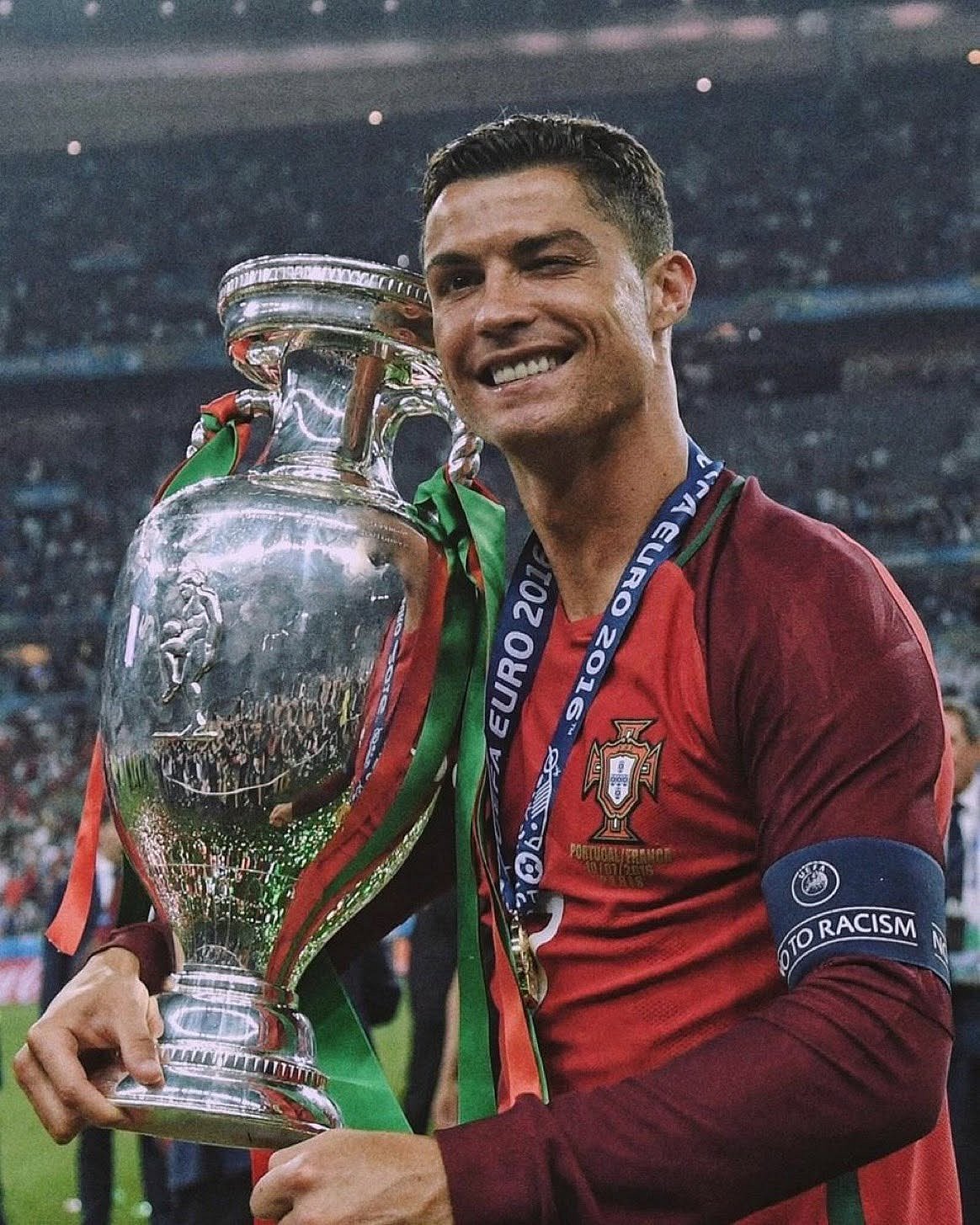Best prize: Ronaldo poses with 2016 Euro trophy